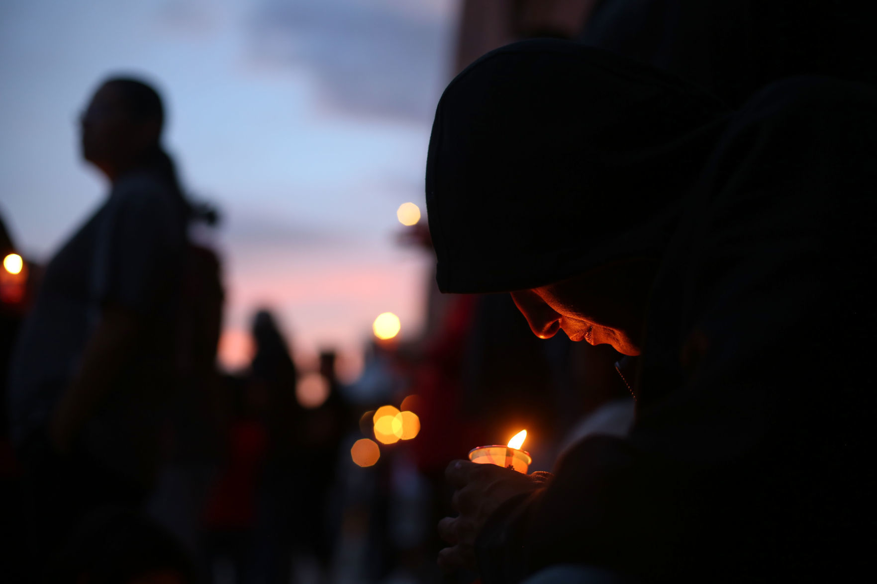 Vigil for man killed in police shooting
